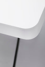 Angle arrondi du bureau Cosimo laqué blanc mat, piètement laqué bronze foncé mat