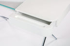 Tiroir ouvert et plateau en verre, bureau Cosimo verre et laqué blanc mat, piètement chromé